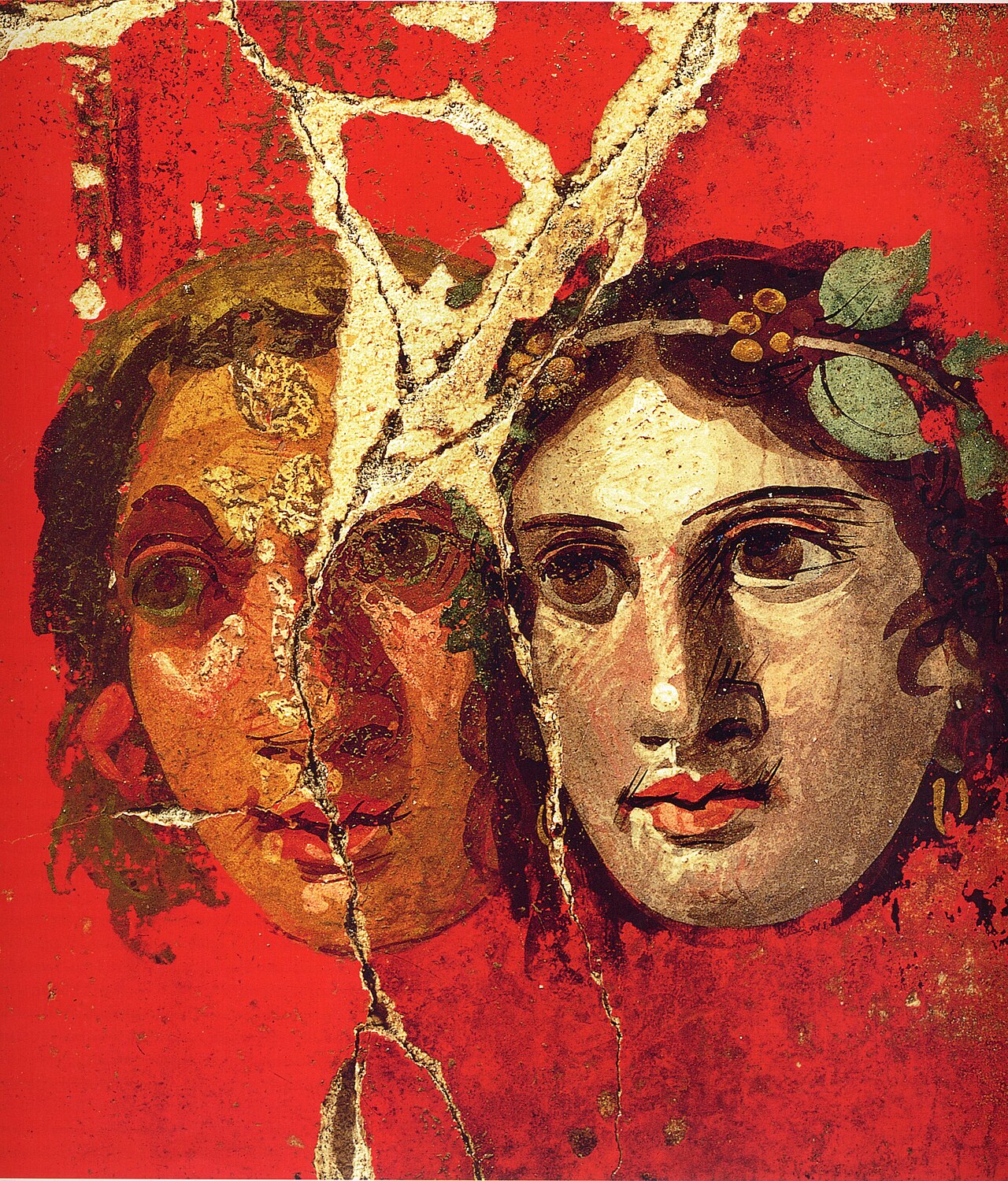 Fresco romano con máscaras de la Casa del Bracciale d'Oro en Pompeya